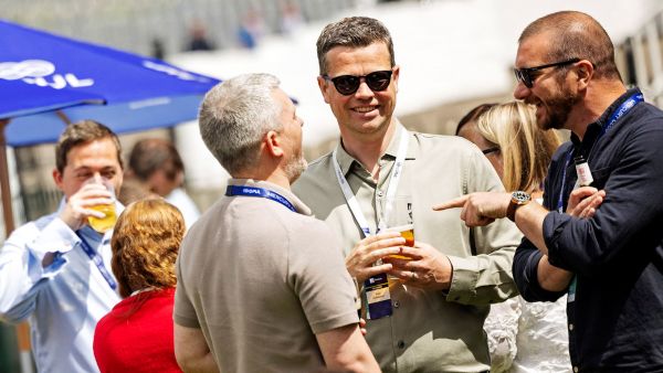 Guests enjoying drinks in the hospitality garden