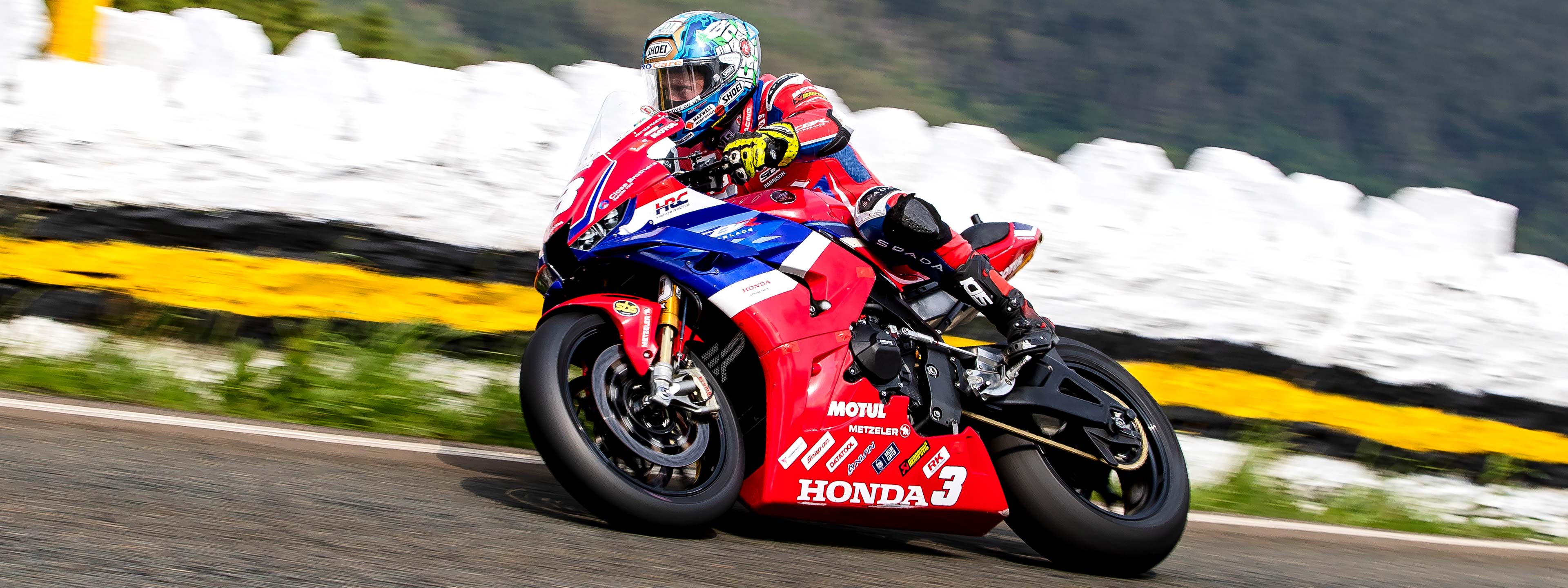 Dean Harrison races a Superstock bike at the Isle of Man TT Races